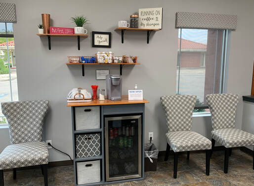 Waiting area and coffee bar at Rumours Hair Design in Nampa, ID